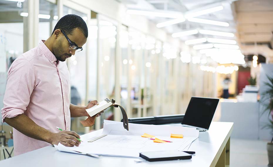 business leader looking at papers