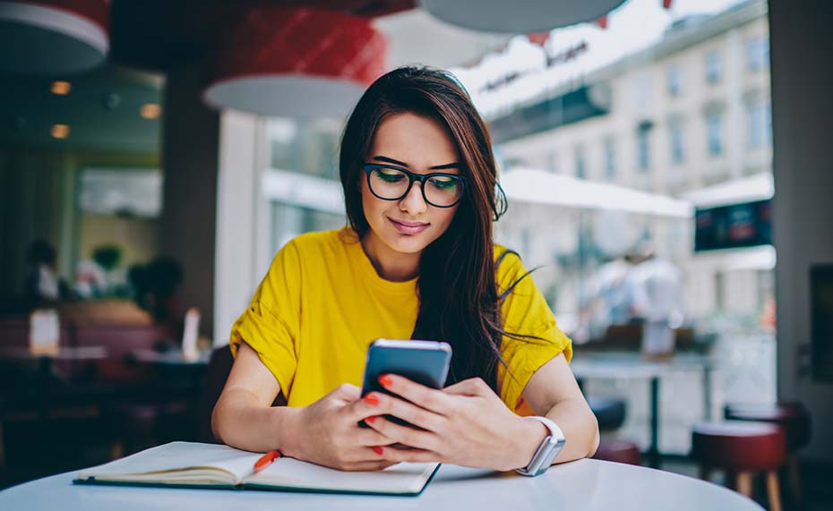 woman looking at phone