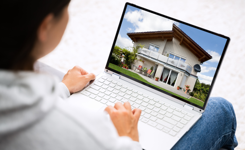 Woman searching for a home on her computer